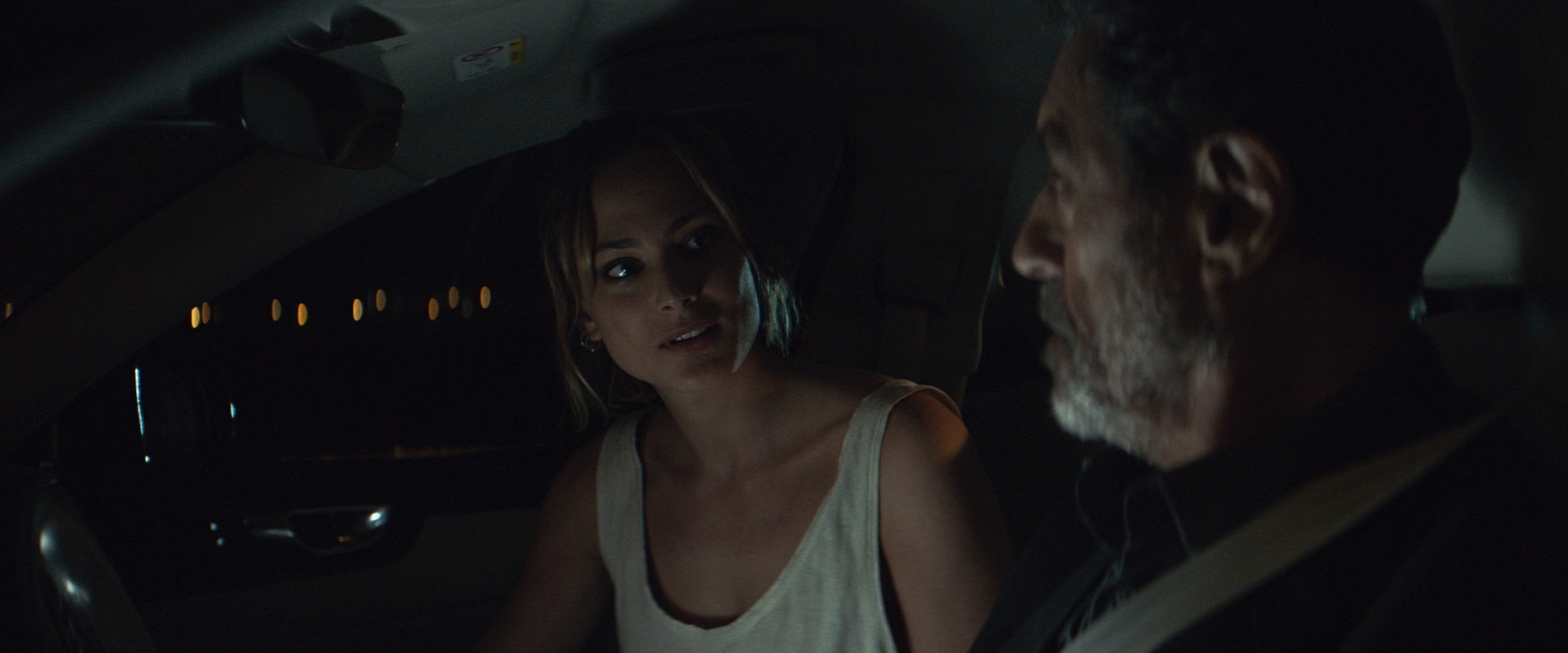 Nora Arnezeder as Nora and Ian McShane as Wilson