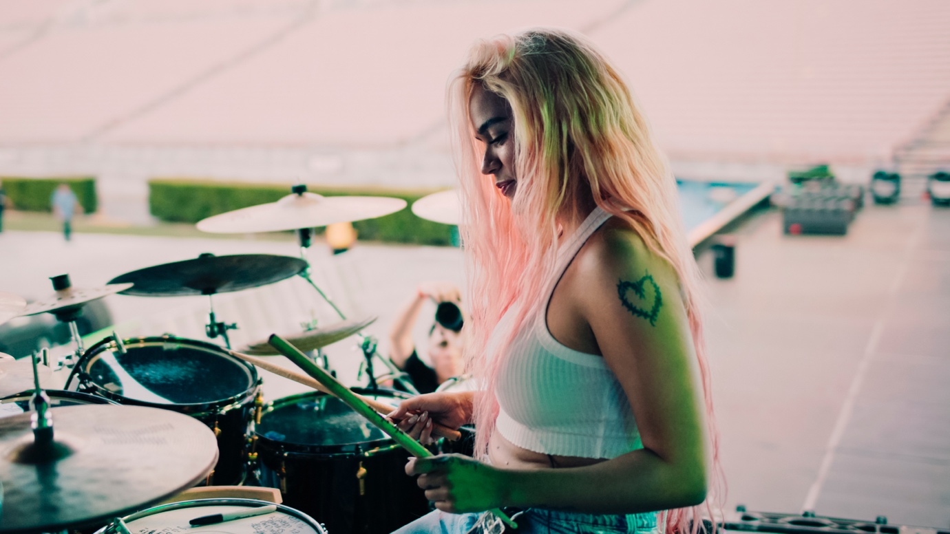 A person playing drums
AI-generated content may be incorrect.