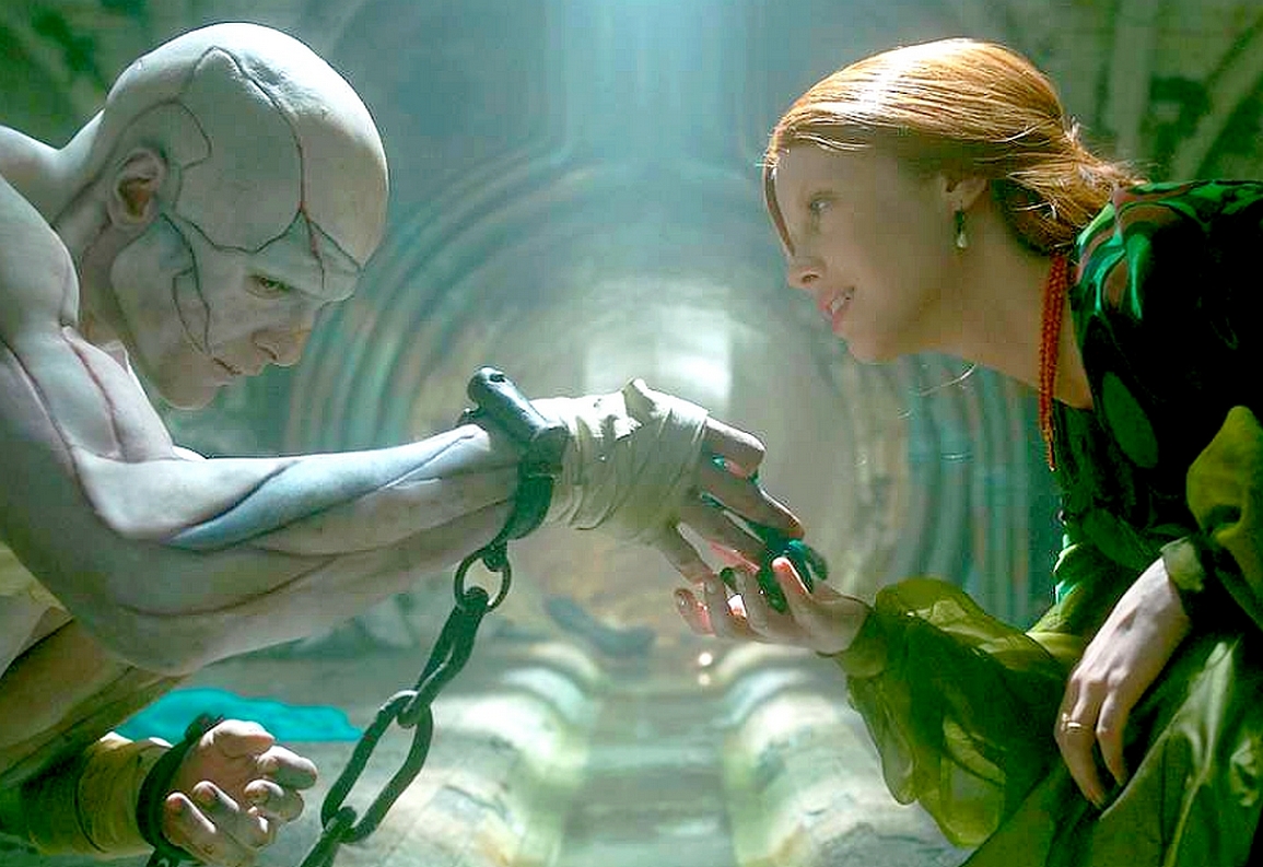 Jacob Elordi as the creature with Mia Goth as Elizabeth